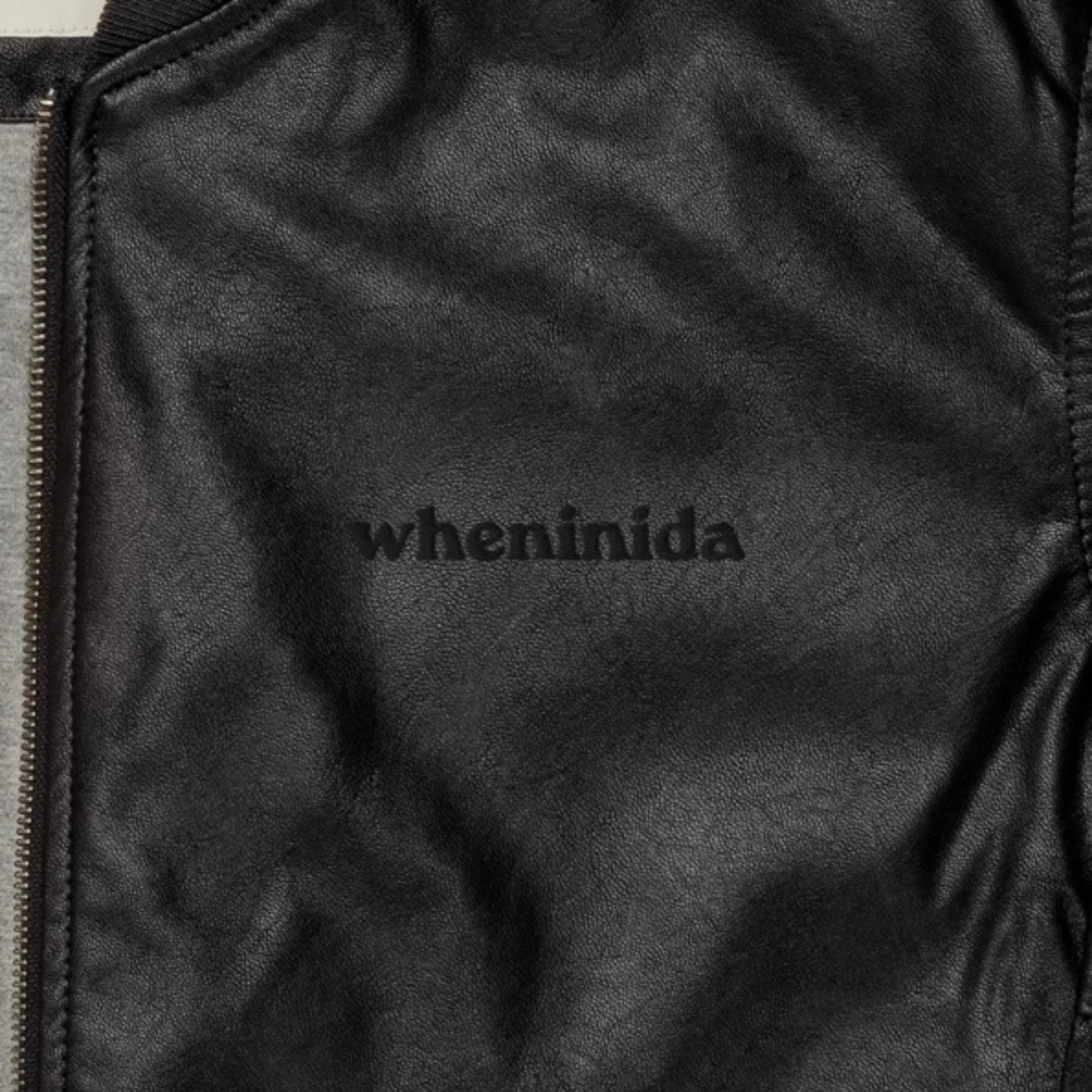 Hidden Logo | Black Faux Leather Bomber Jacket